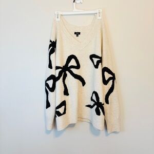 Express Cream Knit Sweater with sparkle black bow details